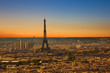 Paris skyline at a summer sunset. Eiffel tower area focused