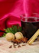 Mulled wine with cinnamon, anise, cloves, nuts (Selective Focus)