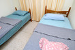 Twin beds in simple motel room