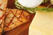 grilled salmon fillet and cheeses