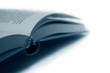 Open Book In Dark Blue, Isolated closeup