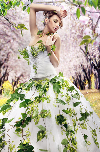 Photo: Stunning brunette in a spring garden Stunning brunette in a spring garden