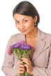 Beautiful young woman with a bouquet of flowers Beautiful young woman with a bouquet of flowers