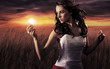 Woman holding a light bulb