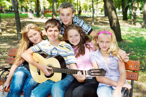 Photo: Teens playing guitar Teens playing guitar