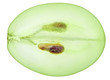 Translucent slice of green grape fruit, macro isolated on white Translucent slice of green grape fruit, macro isolated on white