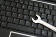 pc keyboard and wrench- computer repair