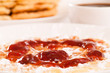 Closeup of waffle with strawberry jam