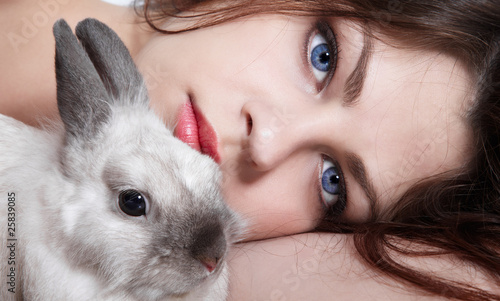 Photo: Girl and pygmy rabbit Girl and pygmy rabbit