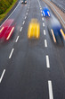 Photo: Motion on highway with color blurred cars Motion on highway with color blurred cars