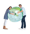 Happy young couple holding a globe on white