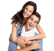 Happy young couple having fun together on white