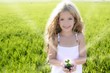 sprout plant growing from little girl hands outdoo