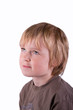 Portrait of a young boy looking away from camera