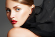 Sensual woman with luxury make-up, sexy lips and black scarf Sensual woman with luxury make-up, sexy lips and black scarf