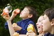 Photo: Children Blowing Bubbles Children Blowing Bubbles