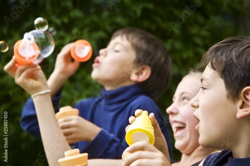 Photo: Children Blowing Bubbles Children Blowing Bubbles