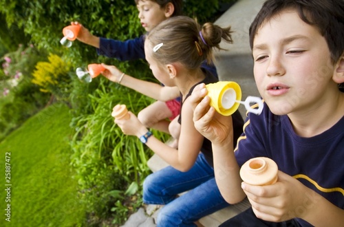 Photo: Children Blowing Bubbles Children Blowing Bubbles