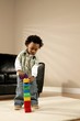 A Boy Playing With Blocks