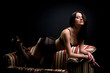 Photo: beautiful brunette on the couch beautiful brunette on the couch