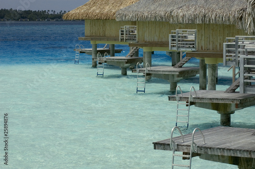 Photo: Overwater bungalows at Bora-Bora lagoon Overwater bungalows at Bora-Bora lagoon
