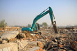 excavator in the construction debris clean up site