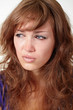 Beautiful girl crying isolated over white