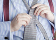 businessman dressing for work