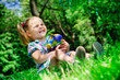 Pretty girl holding new toys for sandbox outdoor Pretty girl holding new toys for sandbox outdoor