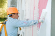 builder facade painter at work builder facade painter at work