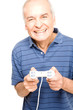 Happy old man playing video games