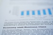 Economy statt Business Class Schlagzeile