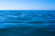 Photo: still calm sea water surface still calm sea water surface