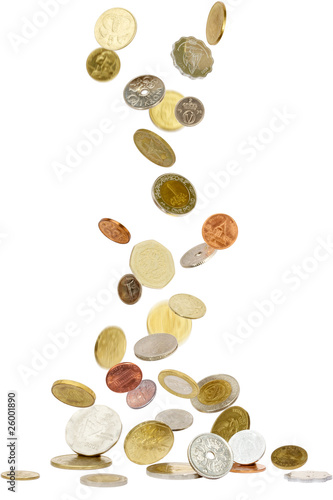 Photo: Coins from all over the world falling to the ground Coins from all over the world falling to the ground