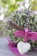 Beautiful basket with a stone heart and heather Beautiful basket with a stone heart and heather