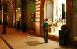 Woman near clothing store window