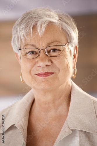 Photo: Portrait of senior woman wearing glasses Portrait of senior woman wearing glasses