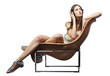 Female sitting in the fashionable chair listening to music
