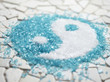 Close up of bath salts in yin-yang pattern