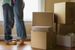 Couple hugging in new home