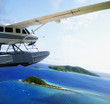 Sea plane flying over water