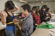 Fashion design students designing clothing