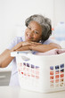 African woman folding laundry