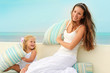 Young mother and her little daughter have a fun outdoor