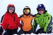 Happy children in ski clothing