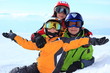 Happy children playing in snow