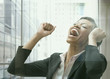 African businesswoman gesturing and smiling