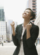 African businesswoman gesturing and smiling