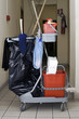 Cleaning service trolley parked in the storeroom corridor