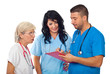 Doctors with clipboard  having converation